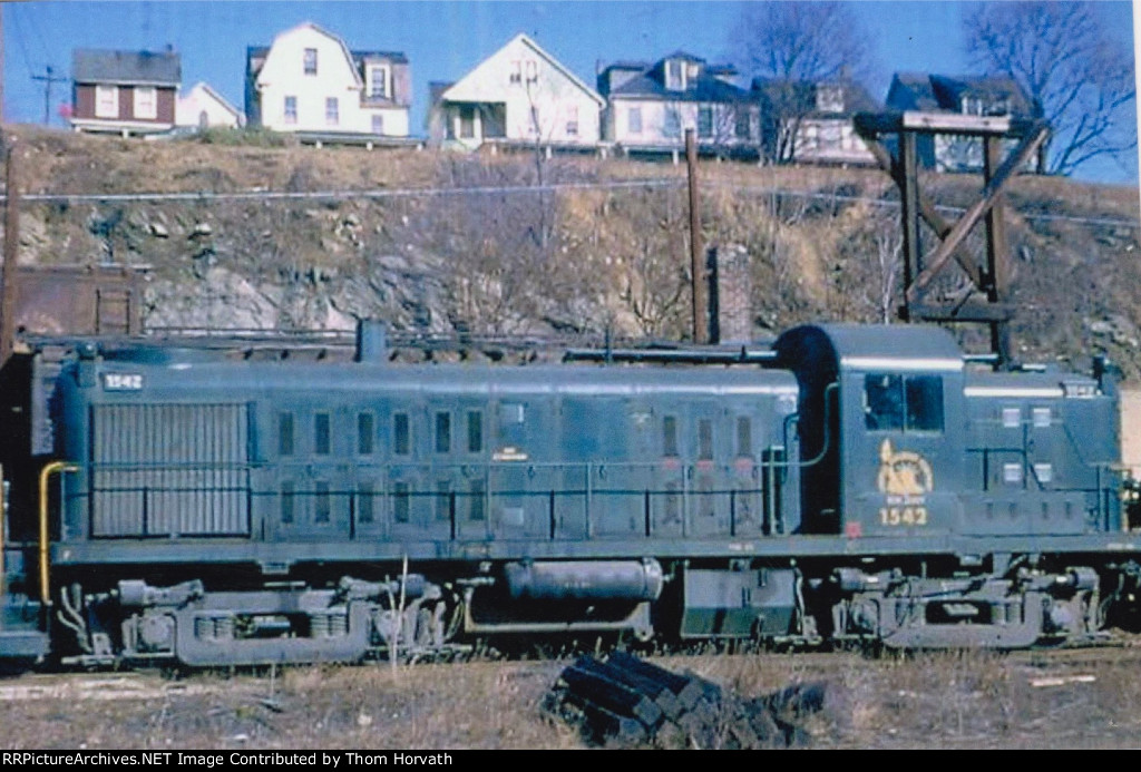 CNJ 1542 stands idle on a sunny January Sunday in the yard